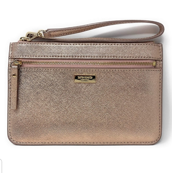 kate spade Handbags - Kate Spade Laurel Way Tinie rose gold wristlet